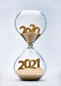 hour glass with 2020 going into 2021