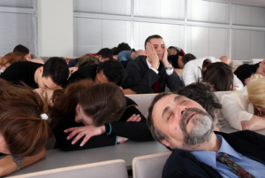 People sleeping during a presentation