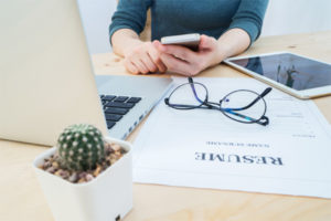 Resume sitting on Hiring Manager's Desk